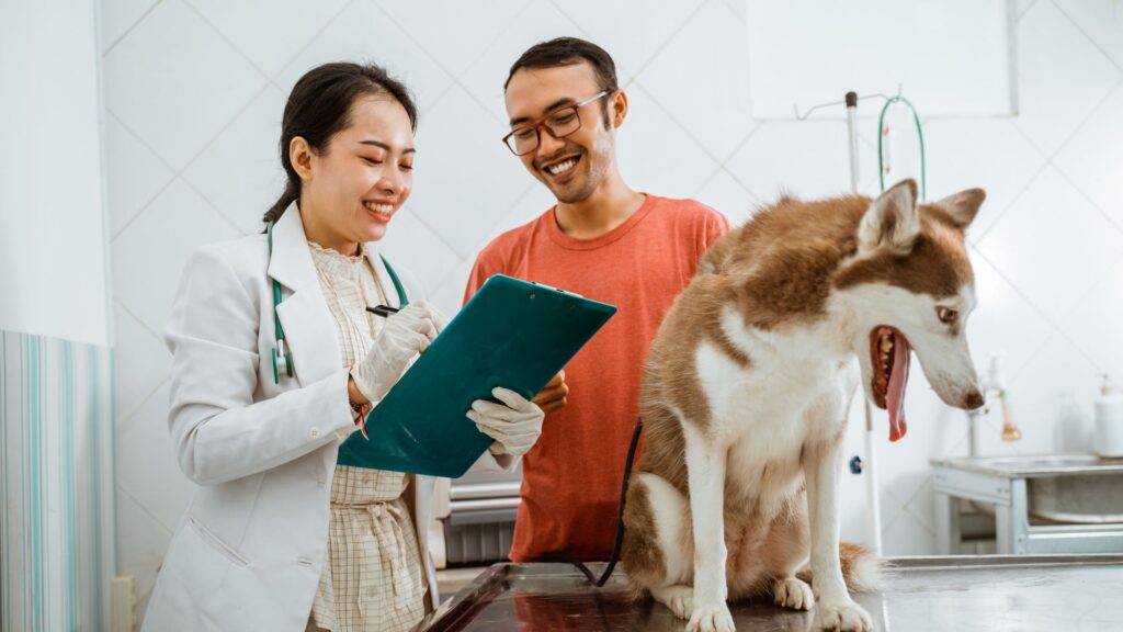 A happy vet with her client
